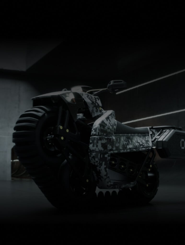 A futuristic motorcycle with a digital camouflage pattern is parked indoors. The design features large, rugged tires and a sleek, angular body. The setting is dimly lit, highlighting the vehicle's unique contours and texture.