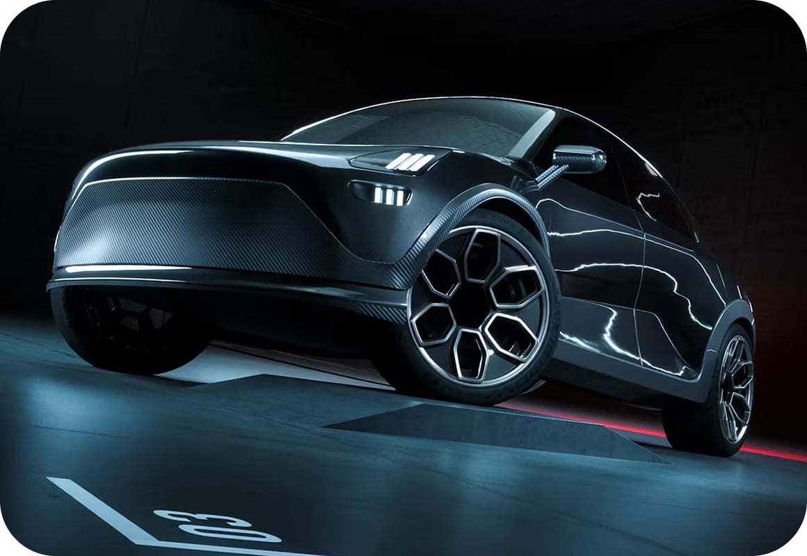 A sleek, modern black electric car with futuristic design and large alloy wheels is showcased in a dimly lit room, reflecting bright white lights on its glossy surface. The number "23" is seen on the floor.
