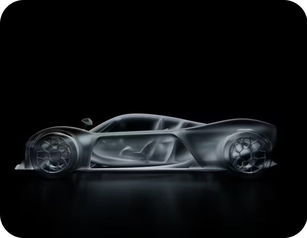 A translucent, futuristic sports car is shown in profile against a black background, revealing the car’s sleek interior and aerodynamic design.